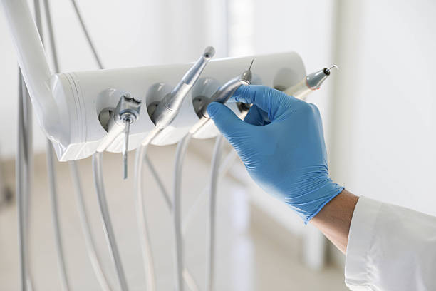 Professional Tooth Extraction technician working in Asheville, NC